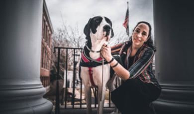 Micaila Britto and her service dog Rabbit