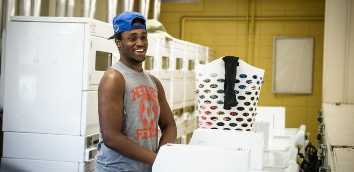 A student does his laundry